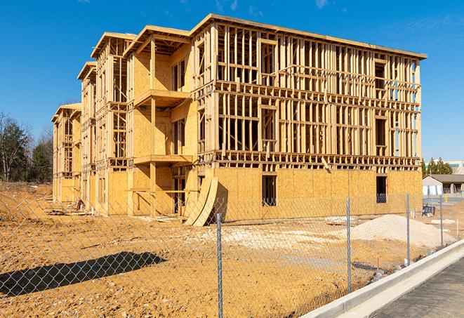 a snapshot of temporary chain link fences protecting a large construction project from unauthorized access in Vail, AZ